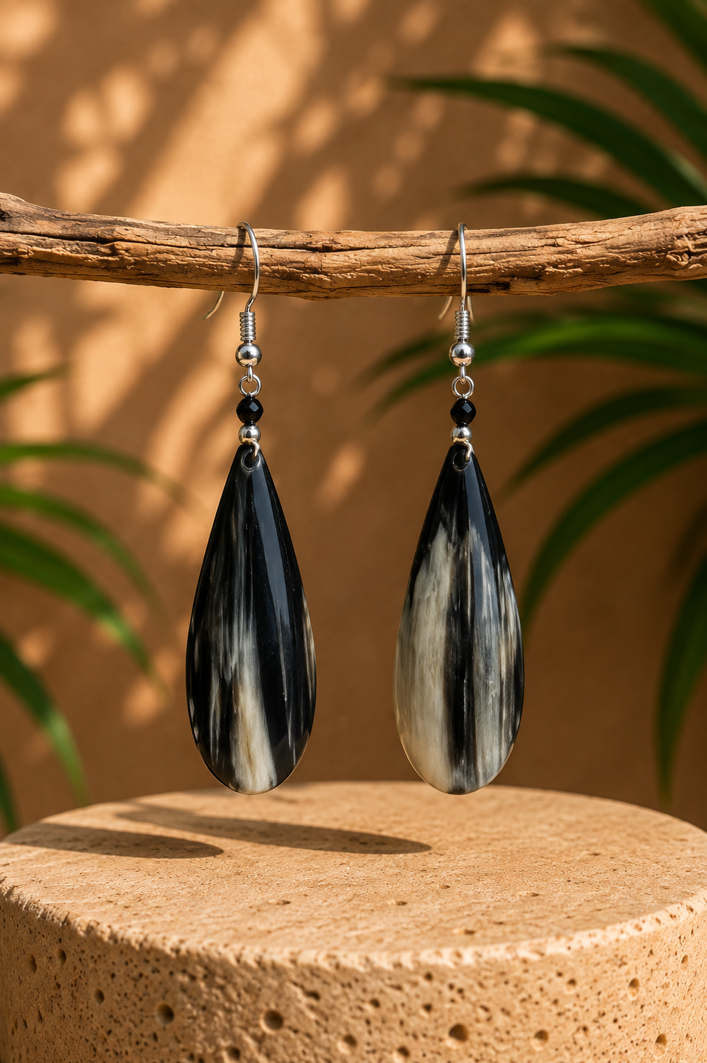 African Earrings Design 9 - black and white marbled teardrop drop earrings on branch
